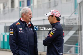 2024-04-06 - MARKO Helmut (aut), Drivers’ Manager of Red Bull Racing, portrait, PEREZ Sergio (mex), Red Bull Racing RB20, portrait, during the Formula 1 MSC Cruises Japanese Grand Prix 2024, 4th round of the 2024 Formula One World Championship from April 5 to 7, 2024 on the Suzuka International Racing Course, in Suzuka, Japan - F1 - JAPANESE GRAND PRIX 2024 - FORMULA 1 - MOTORS