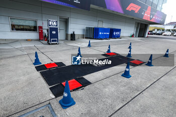 2024-04-06 - FIA weight scrutineering in the pitlane during the Formula 1 MSC Cruises Japanese Grand Prix 2024, 4th round of the 2024 Formula One World Championship from April 5 to 7, 2024 on the Suzuka International Racing Course, in Suzuka, Japan - F1 - JAPANESE GRAND PRIX 2024 - FORMULA 1 - MOTORS