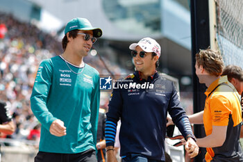 2024-04-07 - STROLL Lance (can), Aston Martin F1 Team AMR24, portrait, PEREZ Sergio (mex), Red Bull Racing RB20, portrait during the Formula 1 MSC Cruises Japanese Grand Prix 2024, 4th round of the 2024 Formula One World Championship from April 5 to 7, 2024 on the Suzuka International Racing Course, in Suzuka, Japan - F1 - JAPANESE GRAND PRIX 2024 - FORMULA 1 - MOTORS