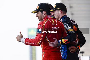 2024-04-07 - SAINZ Carlos (spa), Scuderia Ferrari SF-24, portrait, VERSTAPPEN Max (ned), Red Bull Racing RB20, portrait during the Formula 1 MSC Cruises Japanese Grand Prix 2024, 4th round of the 2024 Formula One World Championship from April 5 to 7, 2024 on the Suzuka International Racing Course, in Suzuka, Japan - F1 - JAPANESE GRAND PRIX 2024 - FORMULA 1 - MOTORS