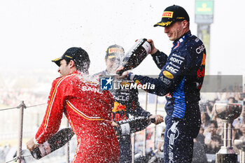 2024-04-07 - VERSTAPPEN Max (ned), Red Bull Racing RB20, portrait SAINZ Carlos (spa), Scuderia Ferrari SF-24, portrait during the Formula 1 MSC Cruises Japanese Grand Prix 2024, 4th round of the 2024 Formula One World Championship from April 5 to 7, 2024 on the Suzuka International Racing Course, in Suzuka, Japan - F1 - JAPANESE GRAND PRIX 2024 - FORMULA 1 - MOTORS