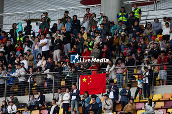 2024-04-19 - Fans in the grandstands during the Formula 1 Lenovo Chinese Grand Prix 2024, 5th round of the 2024 Formula One World Championship from April 19 to 21, 2024 on the Shanghai International Circuit, in Shanghai, China - F1 - CHINESE GRAND PRIX 2024 - FORMULA 1 - MOTORS