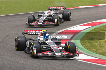 2024-04-19 - 27 HULKENBERG Nico (ger), Haas F1 Team VF-24 Ferrari, action and 20 MAGNUSSEN Kevin (den), Haas F1 Team VF-24 Ferrari, action during the Formula 1 Lenovo Chinese Grand Prix 2024, 5th round of the 2024 Formula One World Championship from April 19 to 21, 2024 on the Shanghai International Circuit, in Shanghai, China - F1 - CHINESE GRAND PRIX 2024 - FORMULA 1 - MOTORS