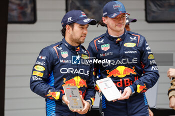 2024-04-20 - PEREZ Sergio (mex), Red Bull Racing RB20, portrait, VERSTAPPEN Max (ned), Red Bull Racing RB20, portrait Sprint Race Podium during the Formula 1 Lenovo Chinese Grand Prix 2024, 5th round of the 2024 Formula One World Championship from April 19 to 21, 2024 on the Shanghai International Circuit, in Shanghai, China - F1 - CHINESE GRAND PRIX 2024 - FORMULA 1 - MOTORS