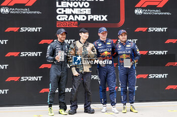 2024-04-20 - VERSTAPPEN Max (ned), Red Bull Racing RB20, portrait, PEREZ Sergio (mex), Red Bull Racing RB20, portrait, HAMILTON Lewis (gbr), Mercedes AMG F1 Team W15, portrait Sprint Race Podium during the Formula 1 Lenovo Chinese Grand Prix 2024, 5th round of the 2024 Formula One World Championship from April 19 to 21, 2024 on the Shanghai International Circuit, in Shanghai, China - F1 - CHINESE GRAND PRIX 2024 - FORMULA 1 - MOTORS