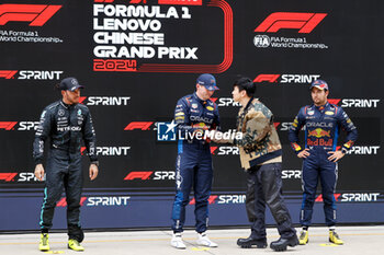2024-04-20 - VERSTAPPEN Max (ned), Red Bull Racing RB20, portrait, PEREZ Sergio (mex), Red Bull Racing RB20, portrait, HAMILTON Lewis (gbr), Mercedes AMG F1 Team W15, portrait Sprint Race Podium during the Formula 1 Lenovo Chinese Grand Prix 2024, 5th round of the 2024 Formula One World Championship from April 19 to 21, 2024 on the Shanghai International Circuit, in Shanghai, China - F1 - CHINESE GRAND PRIX 2024 - FORMULA 1 - MOTORS