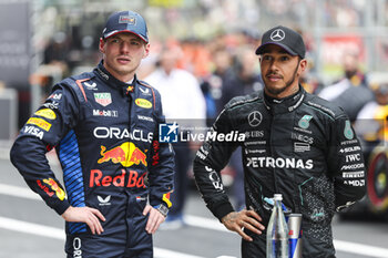 2024-04-20 - VERSTAPPEN Max (ned), Red Bull Racing RB20, portrait and HAMILTON Lewis (gbr), Mercedes AMG F1 Team W15, portrait during the Formula 1 Lenovo Chinese Grand Prix 2024, 5th round of the 2024 Formula One World Championship from April 19 to 21, 2024 on the Shanghai International Circuit, in Shanghai, China - F1 - CHINESE GRAND PRIX 2024 - FORMULA 1 - MOTORS