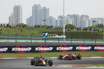 2024-04-20 - 01 VERSTAPPEN Max (nld), Red Bull Racing RB20, action 55 SAINZ Carlos (spa), Scuderia Ferrari SF-24, action during the Formula 1 Lenovo Chinese Grand Prix 2024, 5th round of the 2024 Formula One World Championship from April 19 to 21, 2024 on the Shanghai International Circuit, in Shanghai, China - F1 - CHINESE GRAND PRIX 2024 - FORMULA 1 - MOTORS