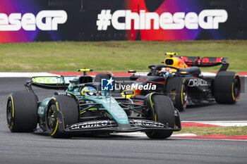 2024-04-21 - 14 ALONSO Fernando (spa), Aston Martin F1 Team AMR24, action and 11 PEREZ Sergio (mex), Red Bull Racing RB20, action during the Formula 1 Lenovo Chinese Grand Prix 2024, 5th round of the 2024 Formula One World Championship from April 19 to 21, 2024 on the Shanghai International Circuit, in Shanghai, China - F1 - CHINESE GRAND PRIX 2024 - FORMULA 1 - MOTORS