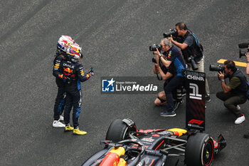 2024-04-21 - VERSTAPPEN Max (ned), Red Bull Racing RB20, portrait PEREZ Sergio (mex), Red Bull Racing RB20, portrait celebration during the Formula 1 Lenovo Chinese Grand Prix 2024, 5th round of the 2024 Formula One World Championship from April 19 to 21, 2024 on the Shanghai International Circuit, in Shanghai, China - F1 - CHINESE GRAND PRIX 2024 - FORMULA 1 - MOTORS