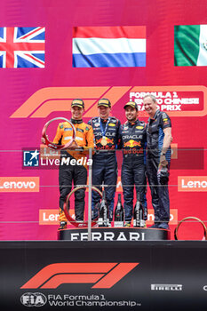 2024-04-21 - NORRIS Lando (gbr), McLaren F1 Team MCL38, portrait, VERSTAPPEN Max (ned), Red Bull Racing RB20, portrait, PEREZ Sergio (mex), Red Bull Racing RB20, portraitN MONAGHAN Paul, Chief Engineer & Car Engineering of Red Bull Racing, portrait podium during the Formula 1 Lenovo Chinese Grand Prix 2024, 5th round of the 2024 Formula One World Championship from April 19 to 21, 2024 on the Shanghai International Circuit, in Shanghai, China - F1 - CHINESE GRAND PRIX 2024 - FORMULA 1 - MOTORS