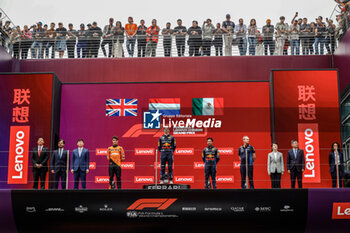 2024-04-21 - BEN SULAYEM Mohammed (uae), President of the FIA, portrait, NORRIS Lando (gbr), McLaren F1 Team MCL38, portrait, VERSTAPPEN Max (ned), Red Bull Racing RB20, portrait, PEREZ Sergio (mex), Red Bull Racing RB20, portraitN MONAGHAN Paul, Chief Engineer & Car Engineering of Red Bull Racing, portrait podium during the Formula 1 Lenovo Chinese Grand Prix 2024, 5th round of the 2024 Formula One World Championship from April 19 to 21, 2024 on the Shanghai International Circuit, in Shanghai, China - F1 - CHINESE GRAND PRIX 2024 - FORMULA 1 - MOTORS