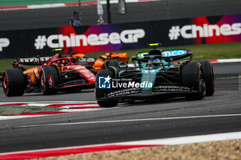 2024-04-21 - 14 ALONSO Fernando (spa), Aston Martin F1 Team AMR24, 55 SAINZ Carlos (spa), Scuderia Ferrari SF-24, action during the Formula 1 Lenovo Chinese Grand Prix 2024, 5th round of the 2024 Formula One World Championship from April 19 to 21, 2024 on the Shanghai International Circuit, in Shanghai, China - F1 - CHINESE GRAND PRIX 2024 - FORMULA 1 - MOTORS