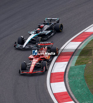 2024-04-21 - 16 LECLERC Charles (mco), Scuderia Ferrari SF-24, action and 63 RUSSELL George (gbr), Mercedes AMG F1 Team W15, action during the Formula 1 Lenovo Chinese Grand Prix 2024, 5th round of the 2024 Formula One World Championship from April 19 to 21, 2024 on the Shanghai International Circuit, in Shanghai, China - F1 - CHINESE GRAND PRIX 2024 - FORMULA 1 - MOTORS