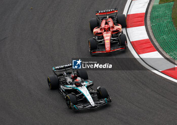 21/04/2024 - 63 RUSSELL George (gbr), Mercedes AMG F1 Team W15, and 16 LECLERC Charles (mco), Scuderia Ferrari SF-24, action action during the Formula 1 Lenovo Chinese Grand Prix 2024, 5th round of the 2024 Formula One World Championship from April 19 to 21, 2024 on the Shanghai International Circuit, in Shanghai, China - F1 - CHINESE GRAND PRIX 2024 - FORMULA 1 - MOTORI