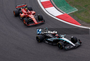2024-04-21 - 63 RUSSELL George (gbr), Mercedes AMG F1 Team W15, and 16 LECLERC Charles (mco), Scuderia Ferrari SF-24, action action during the Formula 1 Lenovo Chinese Grand Prix 2024, 5th round of the 2024 Formula One World Championship from April 19 to 21, 2024 on the Shanghai International Circuit, in Shanghai, China - F1 - CHINESE GRAND PRIX 2024 - FORMULA 1 - MOTORS