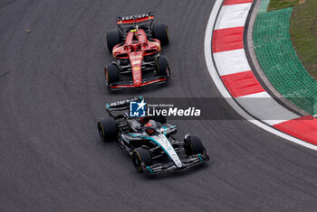 2024-04-21 - 63 RUSSELL George (gbr), Mercedes AMG F1 Team W15, and 16 LECLERC Charles (mco), Scuderia Ferrari SF-24, action action during the Formula 1 Lenovo Chinese Grand Prix 2024, 5th round of the 2024 Formula One World Championship from April 19 to 21, 2024 on the Shanghai International Circuit, in Shanghai, China - F1 - CHINESE GRAND PRIX 2024 - FORMULA 1 - MOTORS
