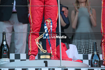 2024-05-26 - Charles Leclerc (MON) - Scuderia Ferrari - Ferrari SF-24 - Ferrari winner trophy and gold dal

Race and celebrations of Formula 1 Grand Prix de Monaco 2024 at Monte Carlo (MC), may 23-26 2024 - FORMULA 1 GRAND PRIX DE MONACO - RACE - FORMULA 1 - MOTORS