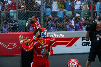 2024-05-26 - Charles Leclerc (MON) - Scuderia Ferrari - Ferrari SF-24 - Ferrari celebrating victory at home 

Race and celebrations of Formula 1 Grand Prix de Monaco 2024 at Monte Carlo (MC), may 23-26 2024 - FORMULA 1 GRAND PRIX DE MONACO - RACE - FORMULA 1 - MOTORS