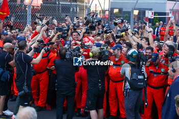 2024-05-26 - Charles Leclerc (MON) - Scuderia Ferrari - Ferrari SF-24 - Ferrari celebrating with team

Race and celebrations of Formula 1 Grand Prix de Monaco 2024 at Monte Carlo (MC), may 23-26 2024 - FORMULA 1 GRAND PRIX DE MONACO - RACE - FORMULA 1 - MOTORS