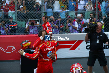 2024-05-26 - Charles Leclerc (MON) - Scuderia Ferrari - Ferrari SF-24 - Ferrari celebrating victory at home 

Race and celebrations of Formula 1 Grand Prix de Monaco 2024 at Monte Carlo (MC), may 23-26 2024 - FORMULA 1 GRAND PRIX DE MONACO - RACE - FORMULA 1 - MOTORS