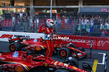 2024-05-26 - Charles Leclerc (MON) - Scuderia Ferrari - Ferrari SF-24 - Ferrari celebrating victory at home 

Race and celebrations of Formula 1 Grand Prix de Monaco 2024 at Monte Carlo (MC), may 23-26 2024 - FORMULA 1 GRAND PRIX DE MONACO - RACE - FORMULA 1 - MOTORS