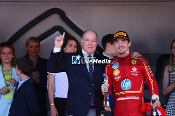 2024-05-26 - her majesty Prince Albert II of Monaco an Charles Leclerc (MON) - Scuderia Ferrari - Ferrari SF-24 - Ferrari on the podium 

during Formula 1 Grand Prix de Monaco 2024 at Monte Carlo (MC), may 23-26 2024 - FORMULA 1 GRAND PRIX DE MONACO - RACE - FORMULA 1 - MOTORS