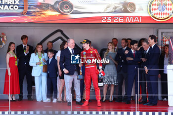 2024-05-26 - her majesty Prince Albert II of Monaco an Charles Leclerc (MON) - Scuderia Ferrari - Ferrari SF-24 - Ferrari on the podium 

during Formula 1 Grand Prix de Monaco 2024 at Monte Carlo (MC), may 23-26 2024 - FORMULA 1 GRAND PRIX DE MONACO - RACE - FORMULA 1 - MOTORS