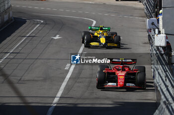 2024-05-26 - Carlos Sainz Jr. (ESP) - Scuderia Ferrari - Ferrari SF-24 - Ferrari and Lando Norris (GBR) - McLaren Formula 1 Team - McLaren MCL38 - Mercedes
during Formula 1 Grand Prix de Monaco 2024 at Monte Carlo (MC), may 23-26 2024 - FORMULA 1 GRAND PRIX DE MONACO - RACE - FORMULA 1 - MOTORS