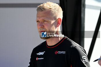 2024-05-18 - Kevin Magnussen Haas Formula LLC MoneyGram Haas Fl Team portrait enters the paddock of Autodromo Internazionale Enzo e Dino Ferrari - FORMULA 1 MSC CRUISES GRAN PREMIO DELL'EMILIA-ROMAGNA 2024 - PADDOCK AND DRIVERS - FORMULA 1 - MOTORS