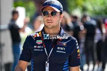 2024-05-18 - Sergio Perez Mendoza Red Bull Racing Limited Oracle Red Bull Racing portrait enters the paddock of Autodromo Internazionale Enzo e Dino Ferrari - FORMULA 1 MSC CRUISES GRAN PREMIO DELL'EMILIA-ROMAGNA 2024 - PADDOCK AND DRIVERS - FORMULA 1 - MOTORS