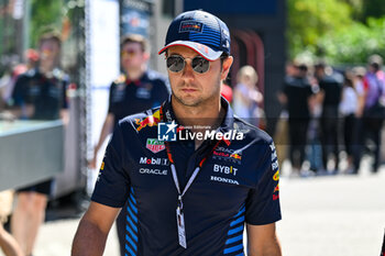 2024-05-18 - Sergio Perez Mendoza Red Bull Racing Limited Oracle Red Bull Racing portrait enters the paddock of Autodromo Internazionale Enzo e Dino Ferrari - FORMULA 1 MSC CRUISES GRAN PREMIO DELL'EMILIA-ROMAGNA 2024 - PADDOCK AND DRIVERS - FORMULA 1 - MOTORS