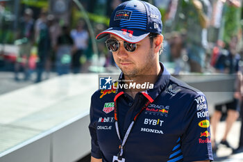 2024-05-18 - Sergio Perez Mendoza Red Bull Racing Limited Oracle Red Bull Racing portrait enters the paddock of Autodromo Internazionale Enzo e Dino Ferrari - FORMULA 1 MSC CRUISES GRAN PREMIO DELL'EMILIA-ROMAGNA 2024 - PADDOCK AND DRIVERS - FORMULA 1 - MOTORS