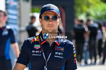 2024-05-18 - Sergio Perez Mendoza Red Bull Racing Limited Oracle Red Bull Racing portrait enters the paddock of Autodromo Internazionale Enzo e Dino Ferrari - FORMULA 1 MSC CRUISES GRAN PREMIO DELL'EMILIA-ROMAGNA 2024 - PADDOCK AND DRIVERS - FORMULA 1 - MOTORS