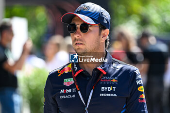 2024-05-18 - Sergio Perez Mendoza Red Bull Racing Limited Oracle Red Bull Racing portrait enters the paddock of Autodromo Internazionale Enzo e Dino Ferrari - FORMULA 1 MSC CRUISES GRAN PREMIO DELL'EMILIA-ROMAGNA 2024 - PADDOCK AND DRIVERS - FORMULA 1 - MOTORS