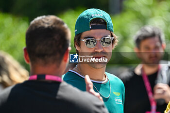 2024-05-18 - Fernando Alonso Diaz AMR GP Limited Aston Martin Aramco Formula One Team portrait enters the paddock of Autodromo Internazionale Enzo e Dino Ferrari - FORMULA 1 MSC CRUISES GRAN PREMIO DELL'EMILIA-ROMAGNA 2024 - PADDOCK AND DRIVERS - FORMULA 1 - MOTORS