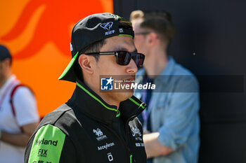 2024-05-18 - Zhou Guanyu Sauber Motorsport AG Stake F1 Team Kick Sauber portrait enters the paddock of Autodromo Internazionale Enzo e Dino Ferrari - FORMULA 1 MSC CRUISES GRAN PREMIO DELL'EMILIA-ROMAGNA 2024 - PADDOCK AND DRIVERS - FORMULA 1 - MOTORS