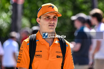 2024-05-18 - Oscar Piastri McLaren Racing Ltd Formula 1 Team portrait enters the paddock of Autodromo Internazionale Enzo e Dino Ferrari - FORMULA 1 MSC CRUISES GRAN PREMIO DELL'EMILIA-ROMAGNA 2024 - PADDOCK AND DRIVERS - FORMULA 1 - MOTORS