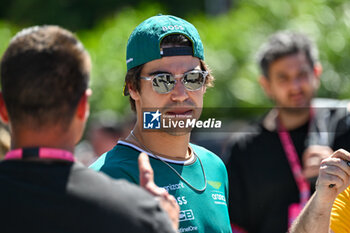 2024-05-18 - Fernando Alonso Diaz AMR GP Limited Aston Martin Aramco Formula One Team portrait enters the paddock of Autodromo Internazionale Enzo e Dino Ferrari - FORMULA 1 MSC CRUISES GRAN PREMIO DELL'EMILIA-ROMAGNA 2024 - PADDOCK AND DRIVERS - FORMULA 1 - MOTORS