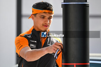 2024-05-18 - Lando Norris McLaren Racing Ltd McLaren Formula 1 Team portrait enters the paddock of Autodromo Internazionale Enzo e Dino Ferrari - FORMULA 1 MSC CRUISES GRAN PREMIO DELL'EMILIA-ROMAGNA 2024 - PADDOCK AND DRIVERS - FORMULA 1 - MOTORS