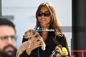 2024-05-18 - Leclerc's girlfriend, Alexandra Saint Mleux and the dog Leo walking in the paddock - FORMULA 1 MSC CRUISES GRAN PREMIO DELL'EMILIA-ROMAGNA 2024 - PADDOCK AND DRIVERS - FORMULA 1 - MOTORS