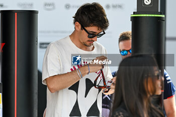 2024-05-18 - Charles Leclerc Ferrari Spa Scuderia Ferrari portrait enters the paddock of Autodromo Internazionale Enzo e Dino Ferrari - FORMULA 1 MSC CRUISES GRAN PREMIO DELL'EMILIA-ROMAGNA 2024 - PADDOCK AND DRIVERS - FORMULA 1 - MOTORS