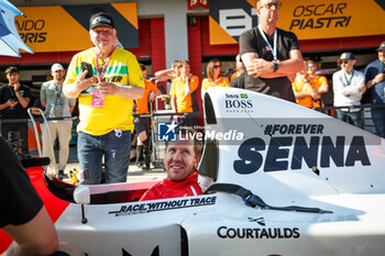 2024-05-18 - VETTEL Sebastian, driving the Mclaren MP4/8 in tribute to Ayrton Senna, in front of his father Norbert during the Formula 1 MSC Cruises Gran Premio del Made in Italy e Dell’Emilia-Romagne 2024, 7th round of the 2024 Formula One World Championship from May 17 to 19, 2024 on the Autodromo Enzo e Dino Ferrari, in Imola, Italy - F1 - EMILIA-ROMAGNA GRAND PRIX 2024 - FORMULA 1 - MOTORS