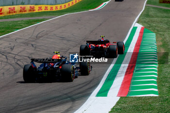 2024-05-18 - 55 SAINZ Carlos (spa), Scuderia Ferrari SF-24, 11 PEREZ Sergio (mex), Red Bull Racing RB20, action during the Formula 1 MSC Cruises Gran Premio del Made in Italy e Dell’Emilia-Romagne 2024, 7th round of the 2024 Formula One World Championship from May 17 to 19, 2024 on the Autodromo Enzo e Dino Ferrari, in Imola, Italy - F1 - EMILIA-ROMAGNA GRAND PRIX 2024 - FORMULA 1 - MOTORS