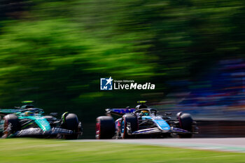 2024-05-18 - 10 GASLY Pierre (fra), Alpine F1 Team A524, 14 ALONSO Fernando (spa), Aston Martin F1 Team AMR24, action during the Formula 1 MSC Cruises Gran Premio del Made in Italy e Dell’Emilia-Romagne 2024, 7th round of the 2024 Formula One World Championship from May 17 to 19, 2024 on the Autodromo Enzo e Dino Ferrari, in Imola, Italy - F1 - EMILIA-ROMAGNA GRAND PRIX 2024 - FORMULA 1 - MOTORS