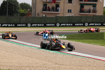 2024-05-18 - 01 VERSTAPPEN Max (nld), Red Bull Racing RB20, action 04 NORRIS Lando (gbr), McLaren F1 Team MCL38, action 16 LECLERC Charles (mco), Scuderia Ferrari SF-24, action 55 SAINZ Carlos (spa), Scuderia Ferrari SF-24, action during the Formula 1 MSC Cruises Gran Premio del Made in Italy e Dell’Emilia-Romagne 2024, 7th round of the 2024 Formula One World Championship from May 17 to 19, 2024 on the Autodromo Enzo e Dino Ferrari, in Imola, Italy - F1 - EMILIA-ROMAGNA GRAND PRIX 2024 - FORMULA 1 - MOTORS