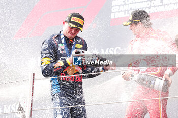 2024-05-18 - VERSTAPPEN Max (ned), Red Bull Racing RB20, portrait LECLERC Charles (mco), Scuderia Ferrari SF-24, portrait podium during the Formula 1 MSC Cruises Gran Premio del Made in Italy e Dell’Emilia-Romagne 2024, 7th round of the 2024 Formula One World Championship from May 17 to 19, 2024 on the Autodromo Enzo e Dino Ferrari, in Imola, Italy - F1 - EMILIA-ROMAGNA GRAND PRIX 2024 - FORMULA 1 - MOTORS