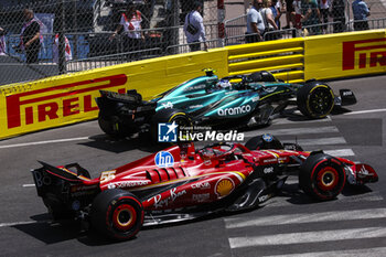 2024-05-25 - 55 SAINZ Carlos (spa), Scuderia Ferrari SF-24 and 14 ALONSO Fernando (spa), Aston Martin F1 Team AMR24, action during the Formula 1 Grand Prix de Monaco 2024, 8th round of the 2024 Formula One World Championship from May 23 to 26, 2024 on the Circuit de Monaco, in Monaco - F1 - MONACO GRAND PRIX 2024 - FORMULA 1 - MOTORS