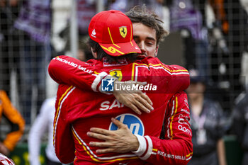 2024-05-26 - LECLERC Charles (mco), Scuderia Ferrari SF-24, portrait, celebrate his win with SAINZ Carlos (spa), Scuderia Ferrari SF-24, portrait during the Formula 1 Grand Prix de Monaco 2024, 8th round of the 2024 Formula One World Championship from May 23 to 26, 2024 on the Circuit de Monaco, in Monaco - F1 - MONACO GRAND PRIX 2024 - FORMULA 1 - MOTORS