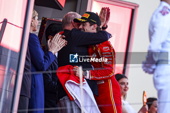 2024-05-26 - LECLERC Charles (mco), Scuderia Ferrari SF-24 and Albert II Grimaldi Prince of Monaco on podium with prince podium during the Formula 1 Grand Prix de Monaco 2024, 8th round of the 2024 Formula One World Championship from May 23 to 26, 2024 on the Circuit de Monaco, in Monaco - F1 - MONACO GRAND PRIX 2024 - FORMULA 1 - MOTORS